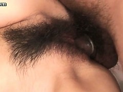 Asian cutie gets hairy cunt pounded