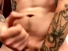 Tattooed male jerking off with dirty talk and moaning and cumming on hand