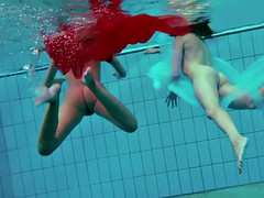 two lovely girls make angel and demon show underwater