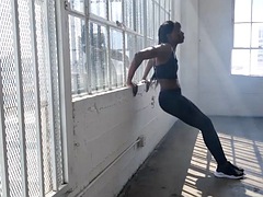 Black pornstar with small tits Ana Foxxx poses naked after a passionate workout