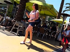 Street voyeur follows a hot brunette teen with a perfect ass