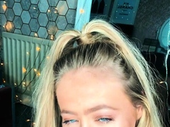 Gorgeous blonde teen flaunts her big natural boobs on webcam