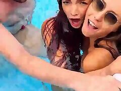 Two sluts suck cocks and get pounded outdoor by the pool live at sexycamx.com